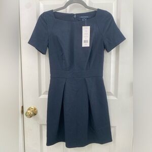 Classic, lovely and NEW WITH TAGS.  French Connectuon size 0 navy with micro dot